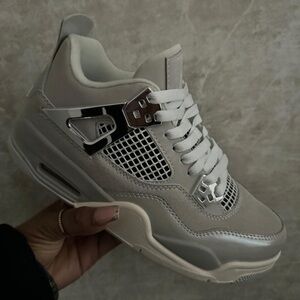 Jordan 4 Frozen Moments